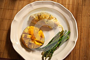 Stuffed chicken, mango, and asparagus low carb dinner