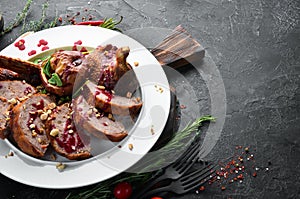 Stuffed duck with cranberry sauce. Restaurant dishes. Top view.