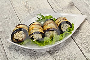 Stuffed eggplant roll with cheese and herbs