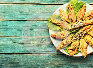 Stuffed fried zucchini flowers,copy space