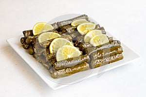 Stuffed leaves with olive oil on a white background. Local name zeytinyagli yaprak sarma photo