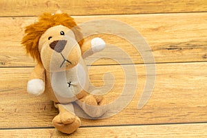 Stuffed lion close up, on colorful background