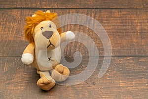 Stuffed lion close up, on colorful background
