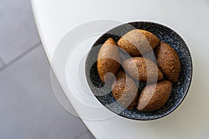 Stuffed Meatballs called Kibbeh pronounced kibbe, kebbah, kubbeh, kubbah or kubbi or ÃÂ°ÃÂ§li KÃÂ¶fte popular dish in Middle Easte photo