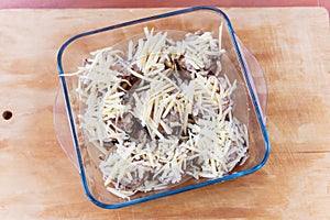 Stuffed mushrooms champignons with cheese cooked in the oven