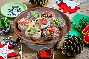 Stuffed mushrooms with Christmas decoration around