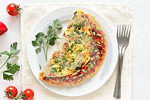 Stuffed omelette with red bell pepper and green onion