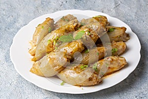 Stuffed Onion Dish. Stuffed onions from traditional Turkish dishes Turkish name; Sogan dolmasi