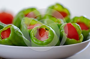 Stuffed peppers in pot ready for cooking