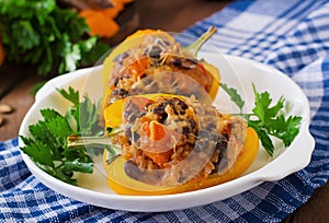 Stuffed peppers with rice, beans and pumpkin