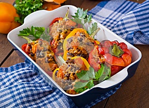 Stuffed peppers with rice, beans and pumpkin