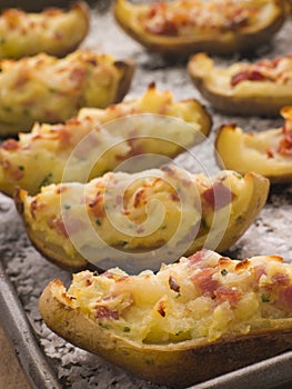 Stuffed Potato Skins a Tray with Sea Salt photo