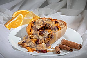 Stuffed pumpkin with nuts and dried fruits.