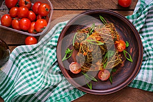 Stuffed savoy cabbage rolls in tomato sauce