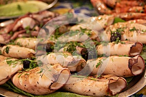 Stuffed squids in Ballaro market at Palermo