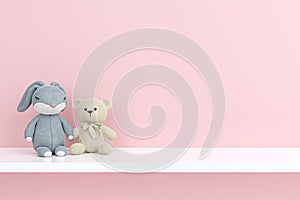 Stuffed toy animals on a white shelf.