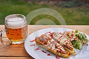 Stuffed yellow pepper with pint of czech pilsner beer.