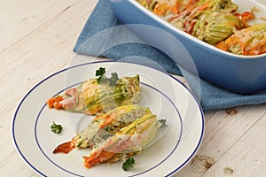 Stuffed zucchini or courgette flowers baked with parmesan cheese