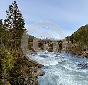 The StuguflÃ¥t Bridge Norwegian: StuguflÃ¥tbrua or StuguflÃ¥ten bru, a stone railway bridge on the Rauma Line over the Rauma