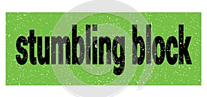 Stumbling block text written on green-black stamp sign