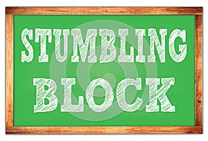 STUMBLING BLOCK words on green wooden frame school blackboard