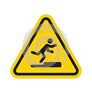 Stumbling man icon in yellow triangle. A warning sign about the danger. Tripping hazard. Watch your step symbol photo