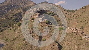Stunning 4k riseup aerial over abandoned ghost town of Roghudi, Calabria Italy