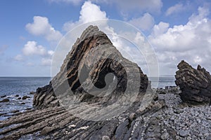 Stunning aerial drone flying landscape image of Blackchurch Rock on Devonian Geological formation