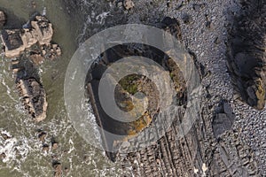 Stunning aerial drone flying landscape image of Blackchurch Rock on Devonian Geological formation