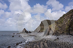 Stunning aerial drone flying landscape image of Blackchurch Rock on Devonian Geological formation