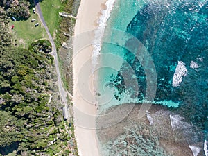 Stunning aerial drone view of Ned`s Beach on Lord Howe Island in the Tasman Sea. Beautiful white sand beach