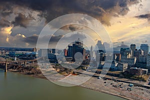 A stunning aerial shot of the skyscrapers and office buildings in the city skyline with blue sky and clouds