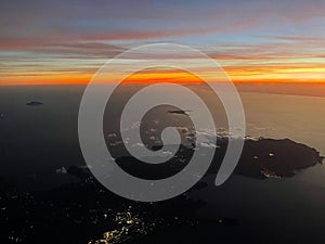Stunning aerial sunset captured from the window of a plane