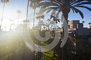 Stunning aerial view of Beverly Hills neighborhood, Beverly Hills Hotel, and Sunset Boulevard surrounded with palm trees