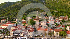 A stunning aerial view of the charming city of Perast in Montenegro, where the Bell Tower in the church of Saint