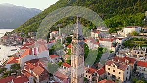 A stunning aerial view of the charming city of Perast in Montenegro, where the Bell Tower in the church of Saint