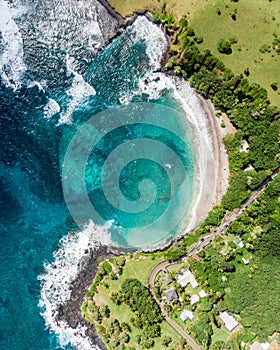 Stunning aerial view of Hamoa Beach, a remote beach located near the little town of Hana on the east side of the island of Maui,