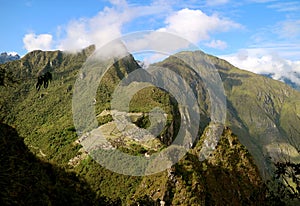 Stunning aerial view of the Inca citadel ruins of Machu Picchu view from Huayna Picchu mountain, Cuzco region, Peru