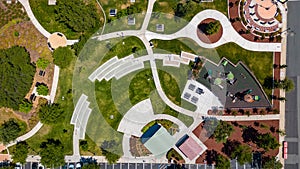 Aerial view of a park in Downtown Oakley, California with green grass and play structures photo