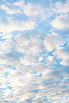 Altocumulus Clouds Lined Up on Bright Blue Sky