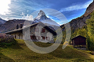 Stunning autumn scenery of famous alp peak Matterhorn. Swiss Alps