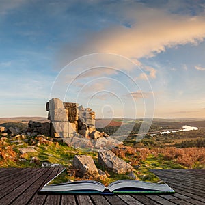 Stunning Autumn sunset landscape image of view from Leather Tor towards Burrator Reservoir in Dartmoor National Park coming out of