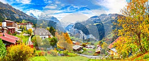 Stunning autumn view of picturesque alpine village Wengen