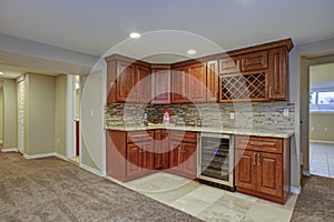 Stunning basement interior with wet bar