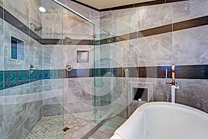 Stunning bathroom with a freestanding tub.