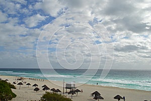 Stunning Beach with Azure Waves Cloudy Blue Sky at Cancun