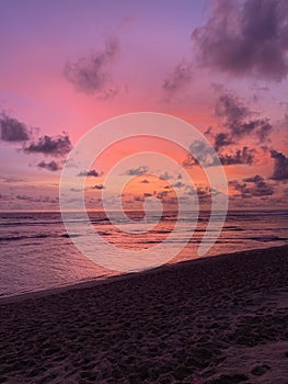 Stunning and Beautiful Sunset Over The Sea Shot From The Beach