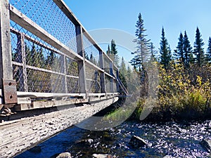 Stunning Bridge Over Running Water in Fall