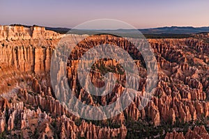 The stunning Bryce Canyon in all its glory before sunrise, amazing limestone hoodoo with various shades of oranges and reds