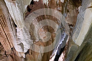 Stunning cave interior with stalactites and stalagmites formation in underground